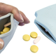 Illustration for article titled Leave the Bottles At Home With This Silicone Pocket Pill Holder